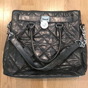 Michael Kors large shimmer gray quilted handbag.